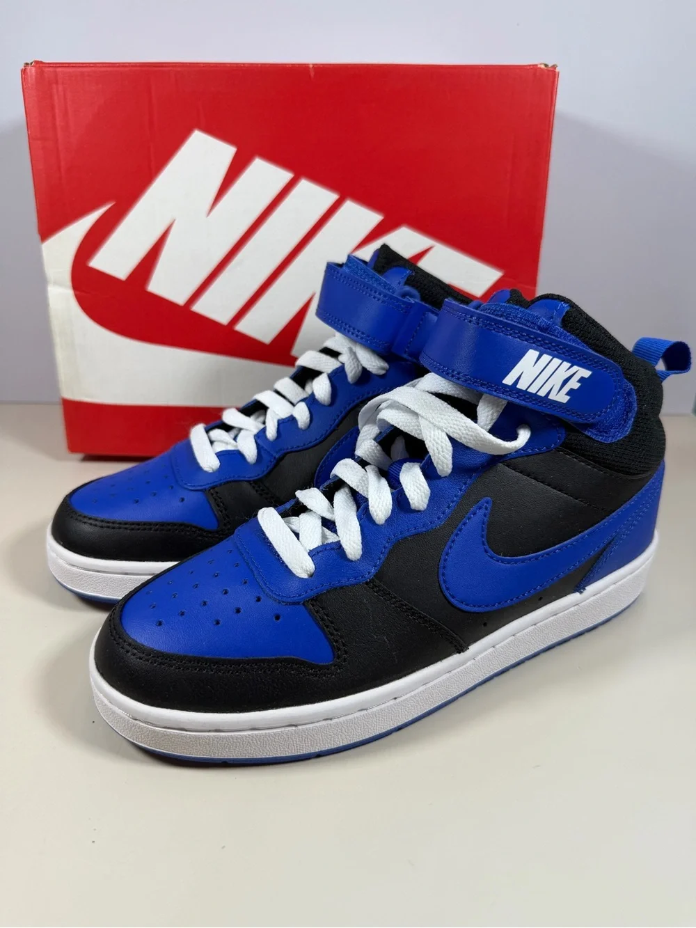 Nike Kids High-Top Sneakers in Black and Royal Blue with White Laces